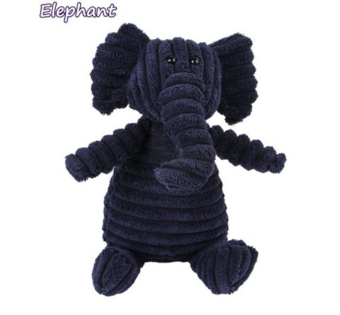 A collection of plush animal toys including a pink pig, brown monkey, white rabbit, orange fox, and a gray sheep, all made from soft corduroy fabric.