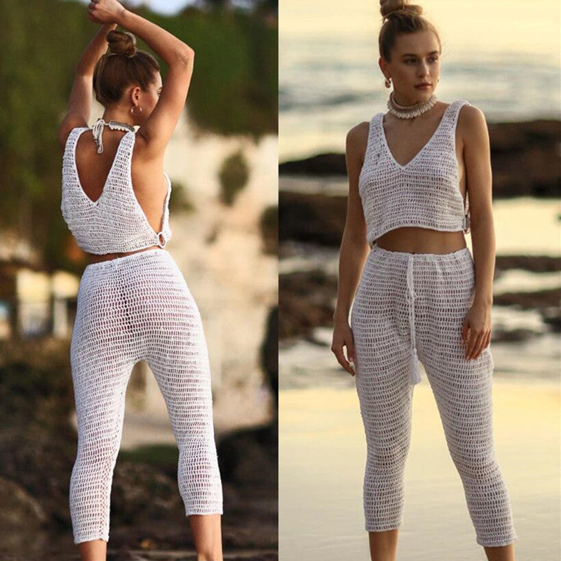 A collage of two images, one showing a woman from the back wearing a white crochet crop top and pants, and the other showing a front view of the same woman wearing the same outfit. Both images are set against a beach backdrop.