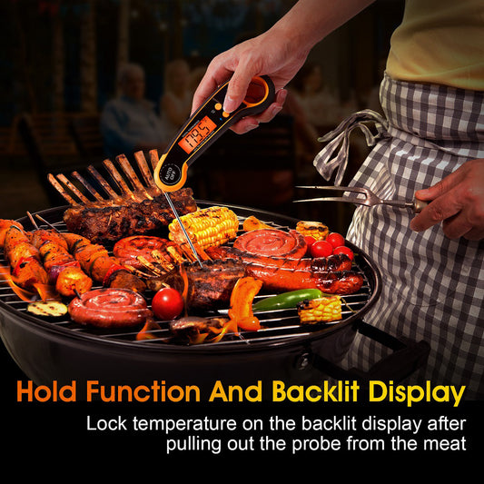 A person is grilling various meats and vegetables on an outdoor grill, using a digital food thermometer with a backlit display to check the temperature of the meat.