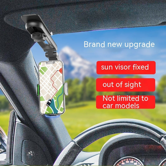 A mobile phone mounted on a car dashboard using a multifunctional on-board bracket with a sun visor fixed mount, positioned in a landscape mode, with a background image of a road and mountains.
