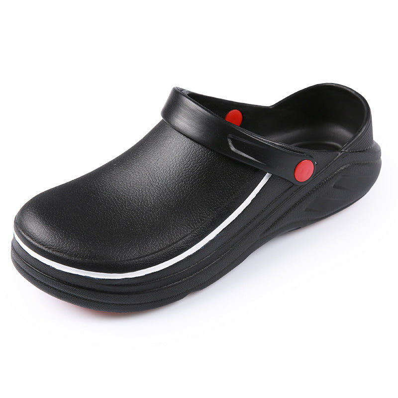 A pair of black non-slip kitchen shoes with red accents designed for chefs.