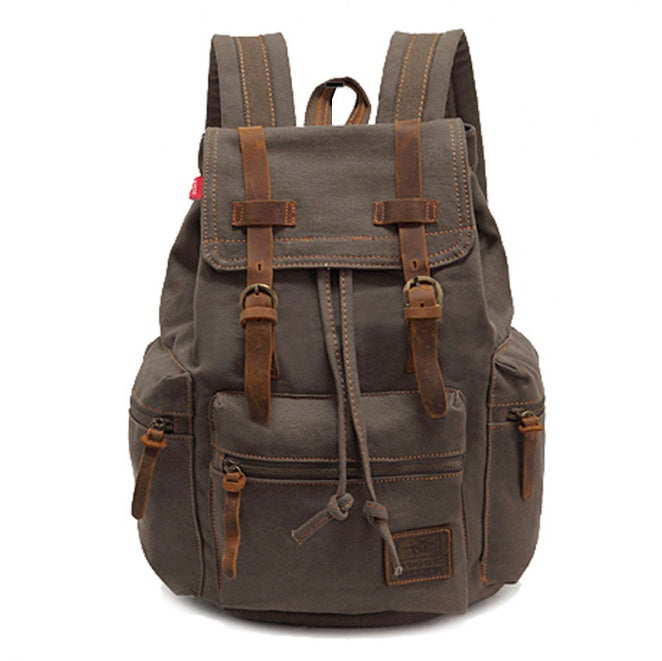 Brown backpack with leather straps on a white background
