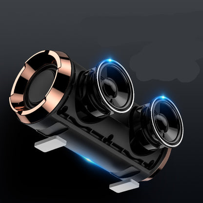 Three cylindrical black portable Bluetooth speakers with a metallic finish and blue LED lights, arranged in a triangular formation.