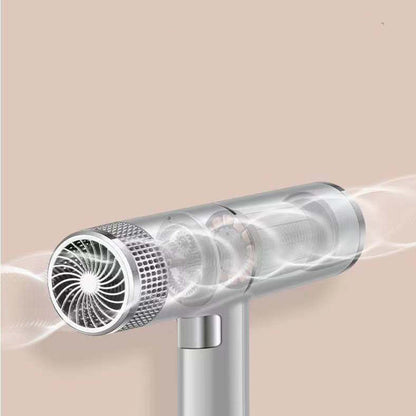 Silver vacuum cleaner head with airflow on a neutral background