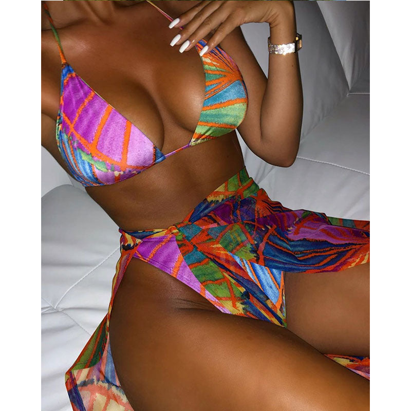 Colorful bikini set against a neutral background