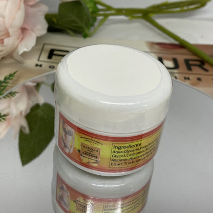 An advertisement image showing a container of KAPOMI body slimming cream with a yellow label. In the background, a person is measuring their waist with a measuring tape.