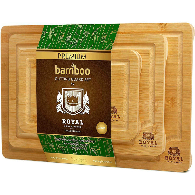 A set of three bamboo cutting boards of varying sizes, with the brand 'Royal' displayed prominently on the packaging.