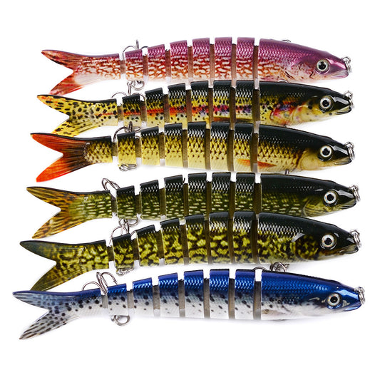 A collection of artificial multi-jointed fishing lures in various colors designed for pike and carp fishing.