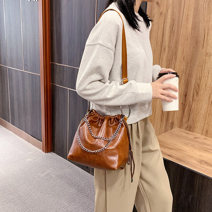 Pleated portable shoulder bag