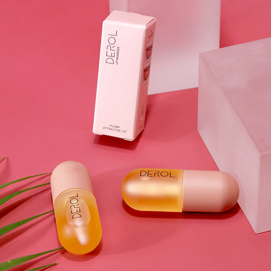 The image shows a lip plumper oil product with a box, bottle, and applicator displayed on a pink background with decorative elements.