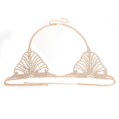 Gold bikini top on a white background