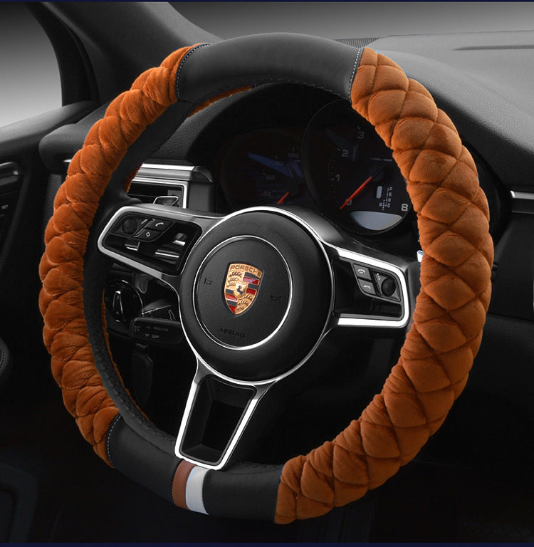 A red plush steering wheel cover with a black interior ring, designed for a vehicle's steering wheel.