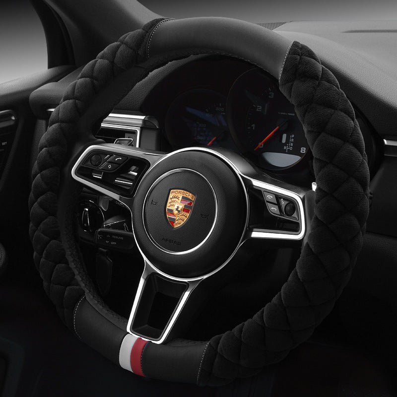 A red plush steering wheel cover with a black interior ring, designed for a vehicle's steering wheel.