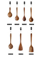 Set of wooden cooking utensils with labels on a white background