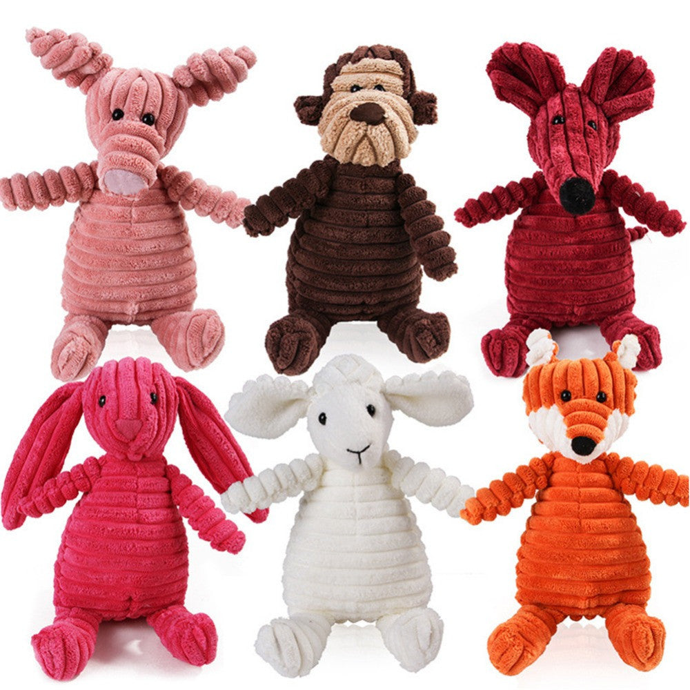 A collection of plush animal toys including a pink pig, brown monkey, white rabbit, orange fox, and a gray sheep, all made from soft corduroy fabric.