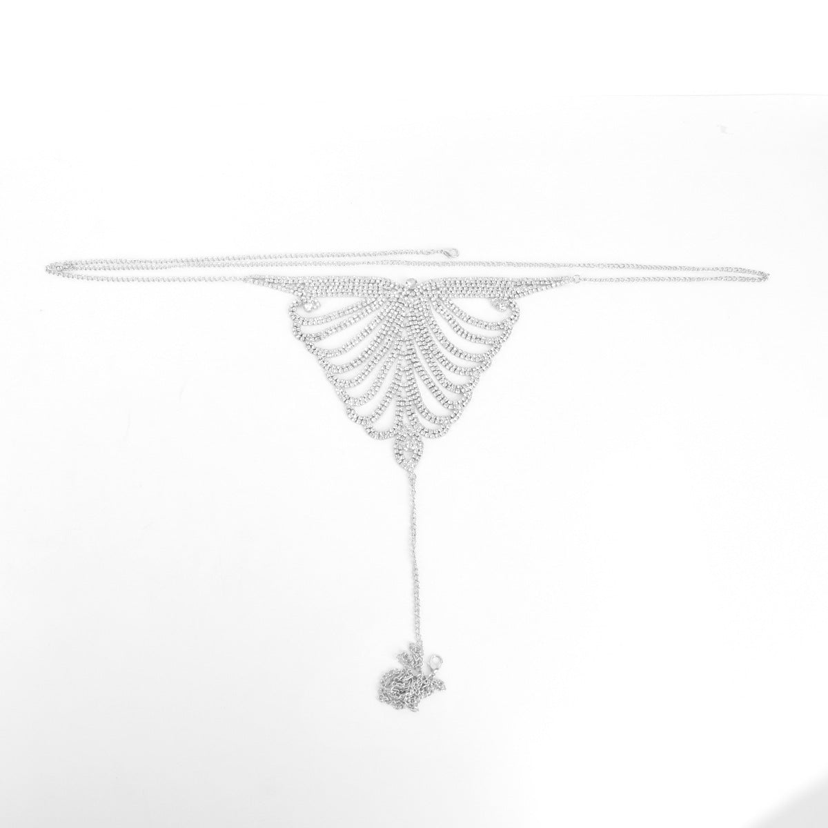 Silver body chain on a white background