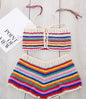 Women's multicolored striped handmade bikini swimsuit with lace details and a tube top design.