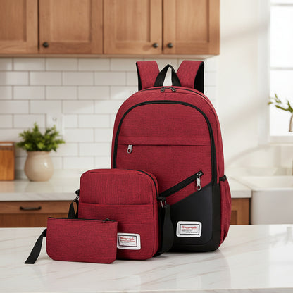 Red backpack and matching pouch with black accents on a white background