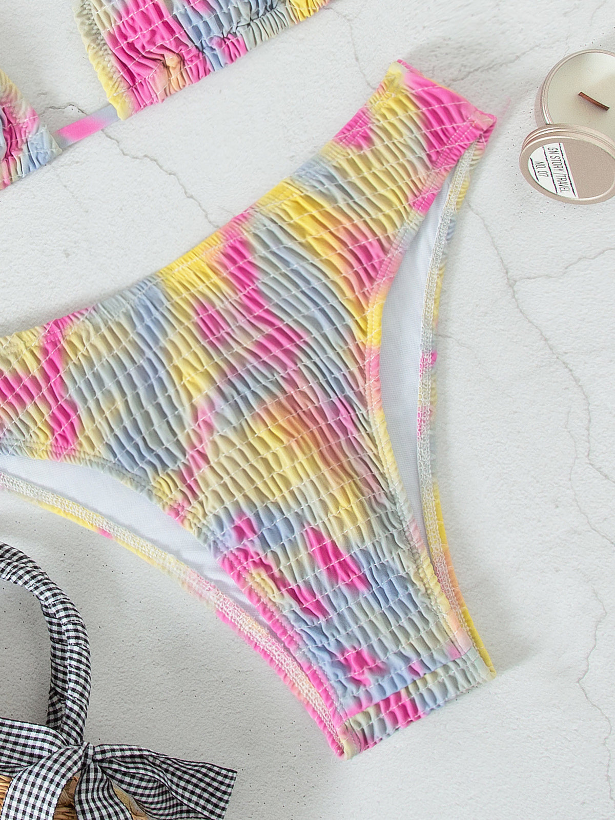 Colorful knitted item on a white surface