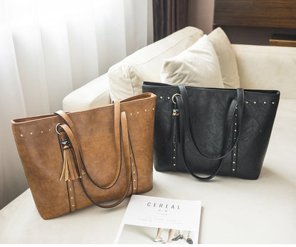 Women's Studded Tote Shoulder Bag – Vegan-Friendly Imitation Leather Tassel Handbag