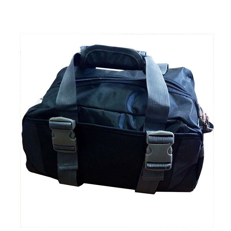 Black duffel bag with gray handles and buckles on a white background