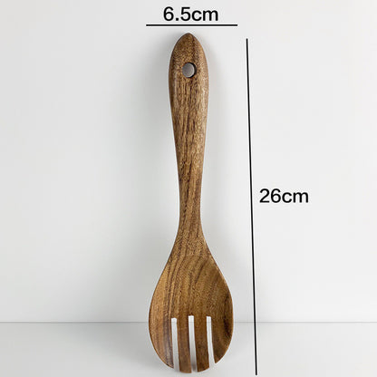 Wooden spatula with measurements on a white background