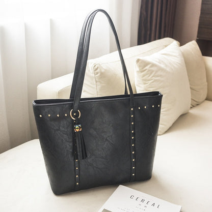 Women's Studded Tote Shoulder Bag – Vegan-Friendly Imitation Leather Tassel Handbag