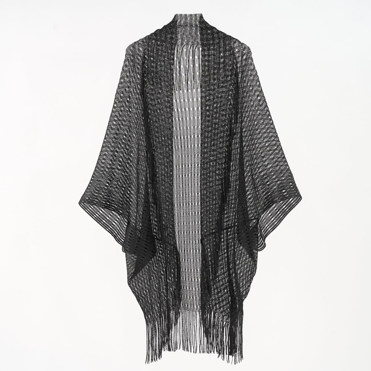 Black and white poncho with fringe on a white background