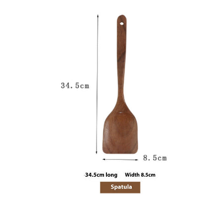 Wooden spatula with measurements on a white background