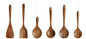Set of wooden cooking utensils hanging against a white background