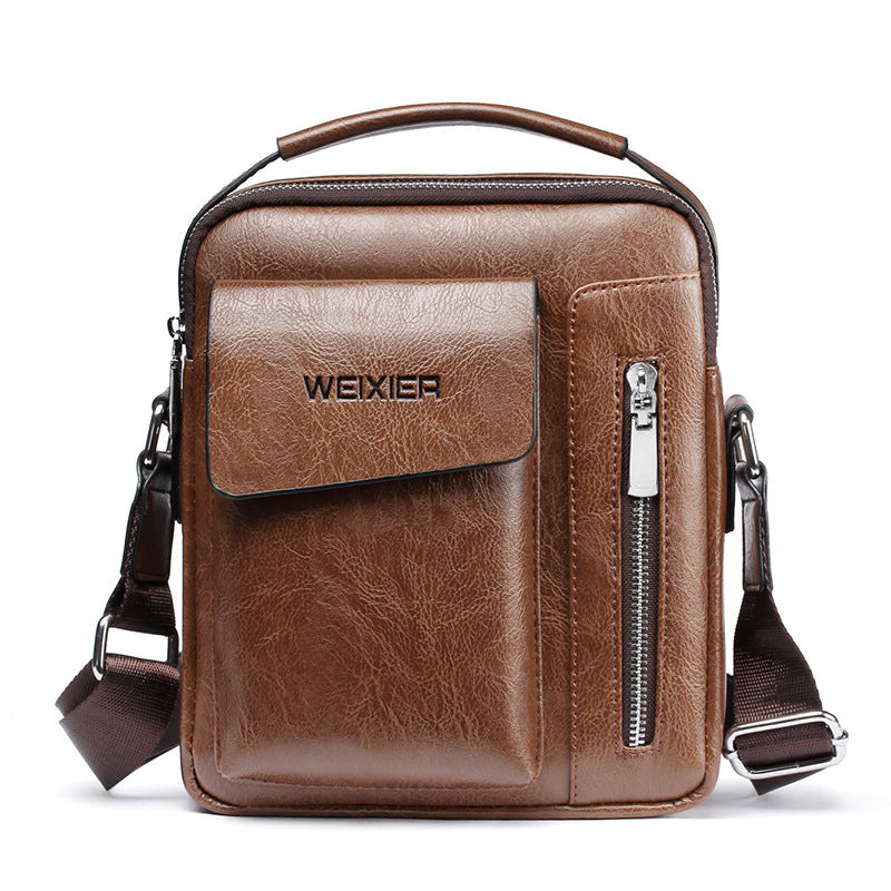 A brown vertical style leisure and business handbag with a zipper and a handle, made from high-quality PU material.
