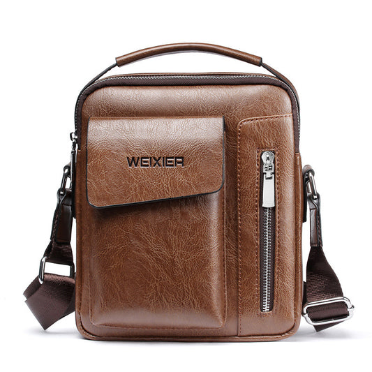 A brown vertical style leisure and business handbag with a zipper and a handle, made from high-quality PU material.