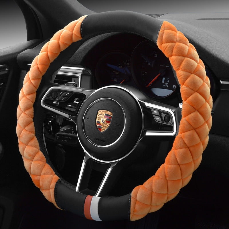A red plush steering wheel cover with a black interior ring, designed for a vehicle's steering wheel.