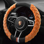 A red plush steering wheel cover with a black interior ring, designed for a vehicle's steering wheel.