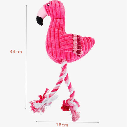 Pink flamingo-shaped toy with a rope, showing measurements on a white background