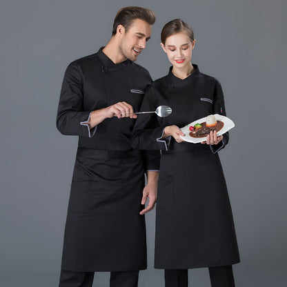 A male and a female chef wearing black long-sleeved chef working clothes, with the male chef holding a spoon and the female chef holding a plate with food.