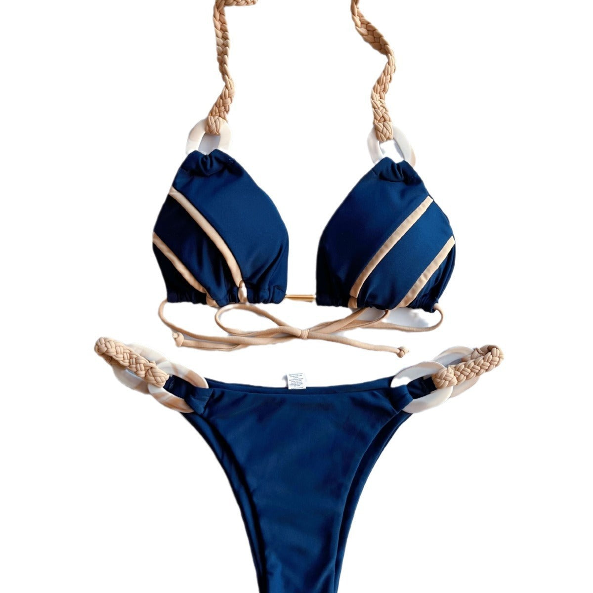 Blue bikini set with beige accents on a white background