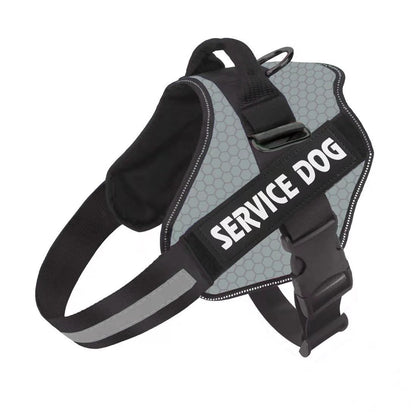 A black dog harness with 'SERVICE DOG' text printed on the back, equipped with adjustable straps and a buckle.