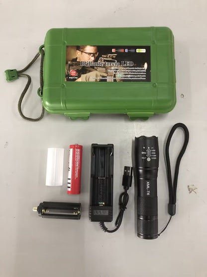 Green hard case with flashlight and accessories on a white background