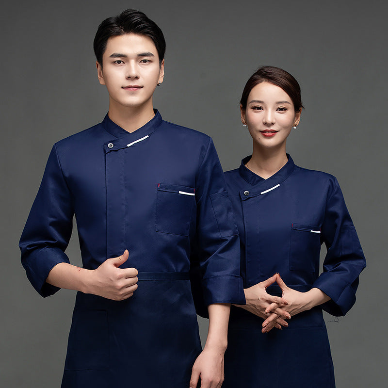 A male and a female chef wearing a long sleeve chef uniform in navy blue color.