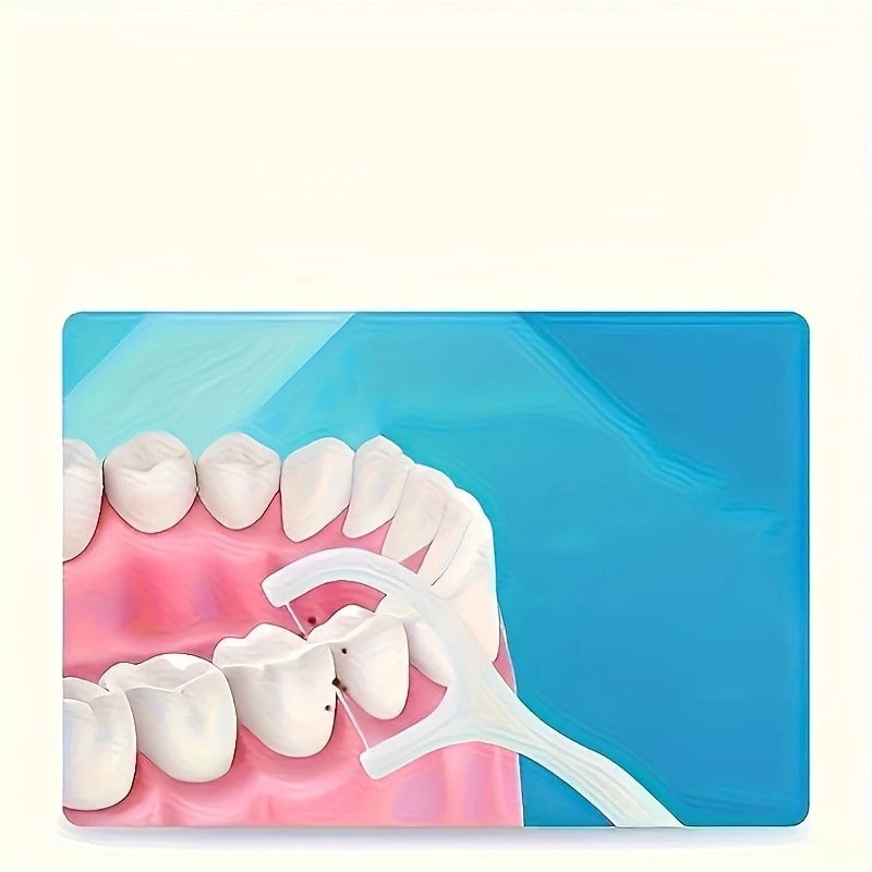 Dental tool on a model of teeth with a blue background