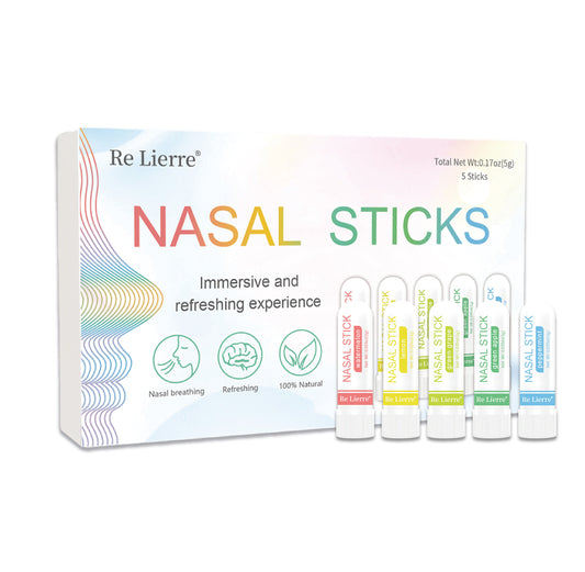 Packaging of Re Lierre Nasal Sticks with five individual sticks displayed in front of the box. The box is colorful with rainbow stripes and the sticks have various color labels.