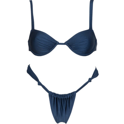 A woman standing by a poolside wearing a navy blue bikini suit with a solid color pattern, featuring a top with steel bracket support and briefs.