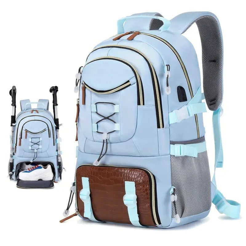 A large capacity blue and brown outdoor backpack with multiple compartments and shoulder straps