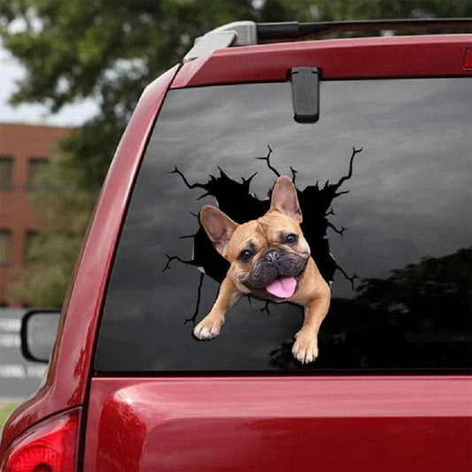 A car window electrostatic sticker featuring a cute puppy appearing as if breaking through the glass.