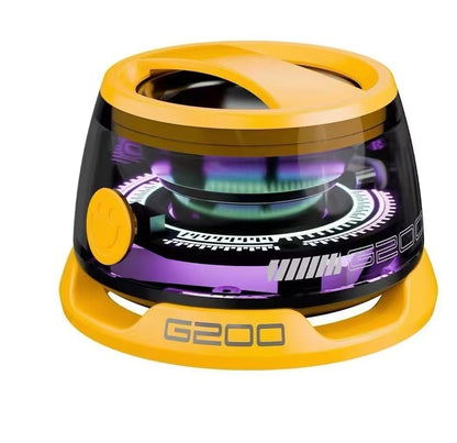 A portable Bluetooth speaker with RGB lighting, displayed in a transparent case, showing internal components and a magnetic phone holder.