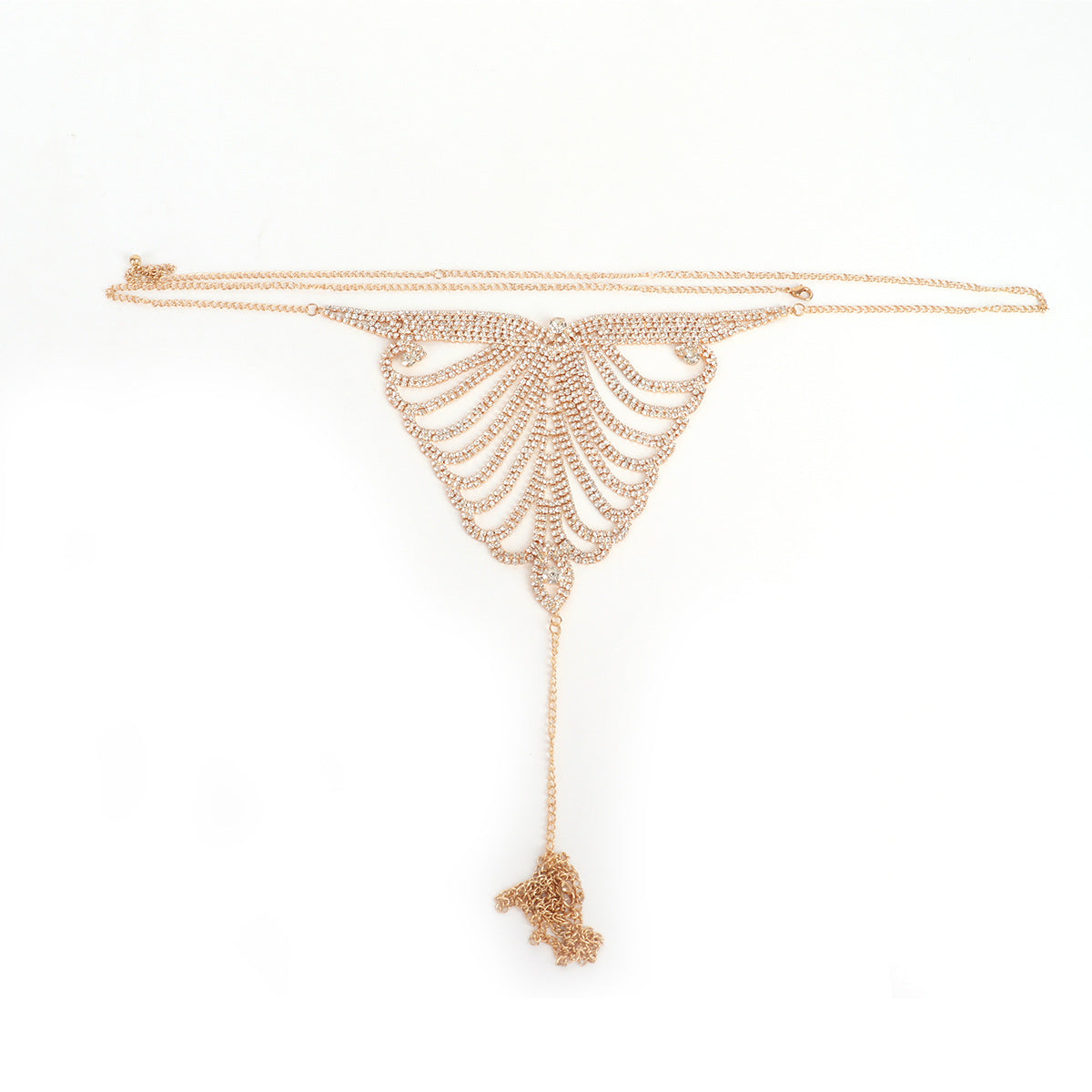 Gold skeleton-themed necklace on a white background