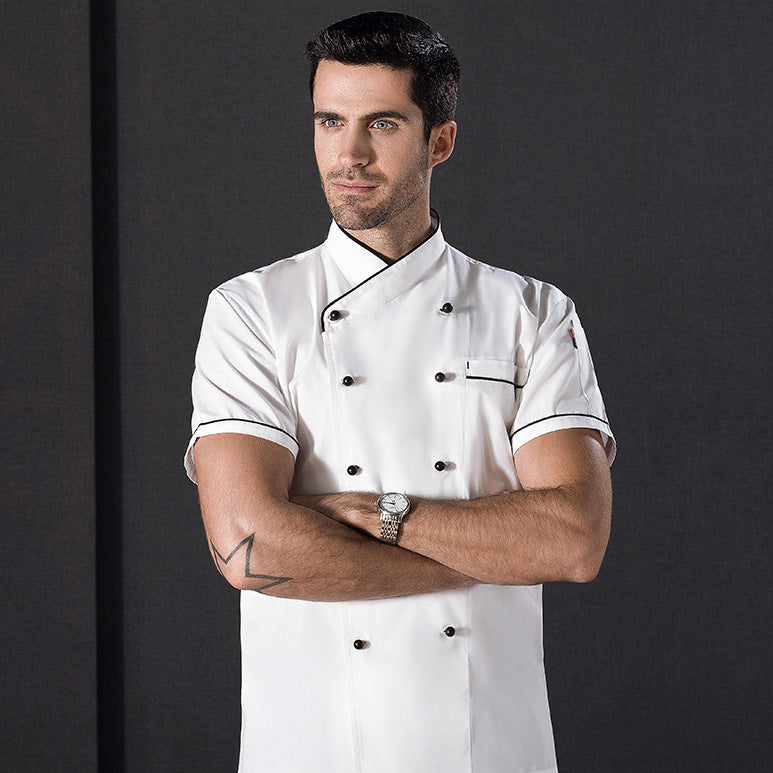 A male model wearing a white short sleeve chef's uniform with double-breasted button closure and a name tag.