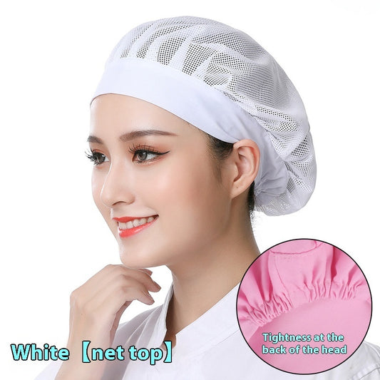 A person wearing a white mesh fitted chef cap with an adjustable tie at the back of the head.