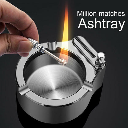 A stainless steel ashtray with a permanent match lighter, showing a lit match to illustrate the functionality of the lighter mechanism.